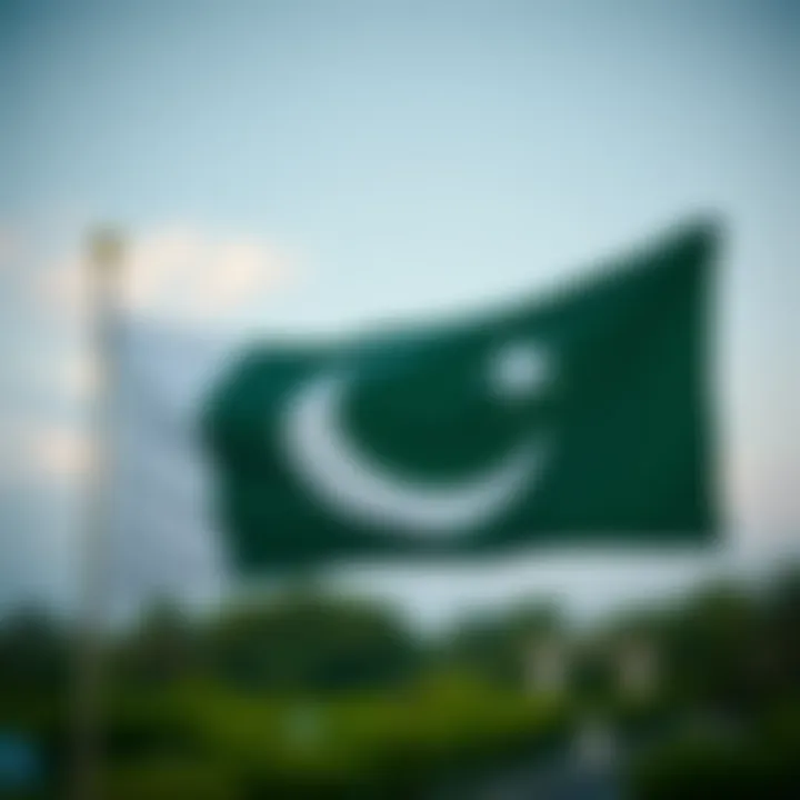 Green and white national flag of Pakistan with a crescent and star symbolizing progress and light